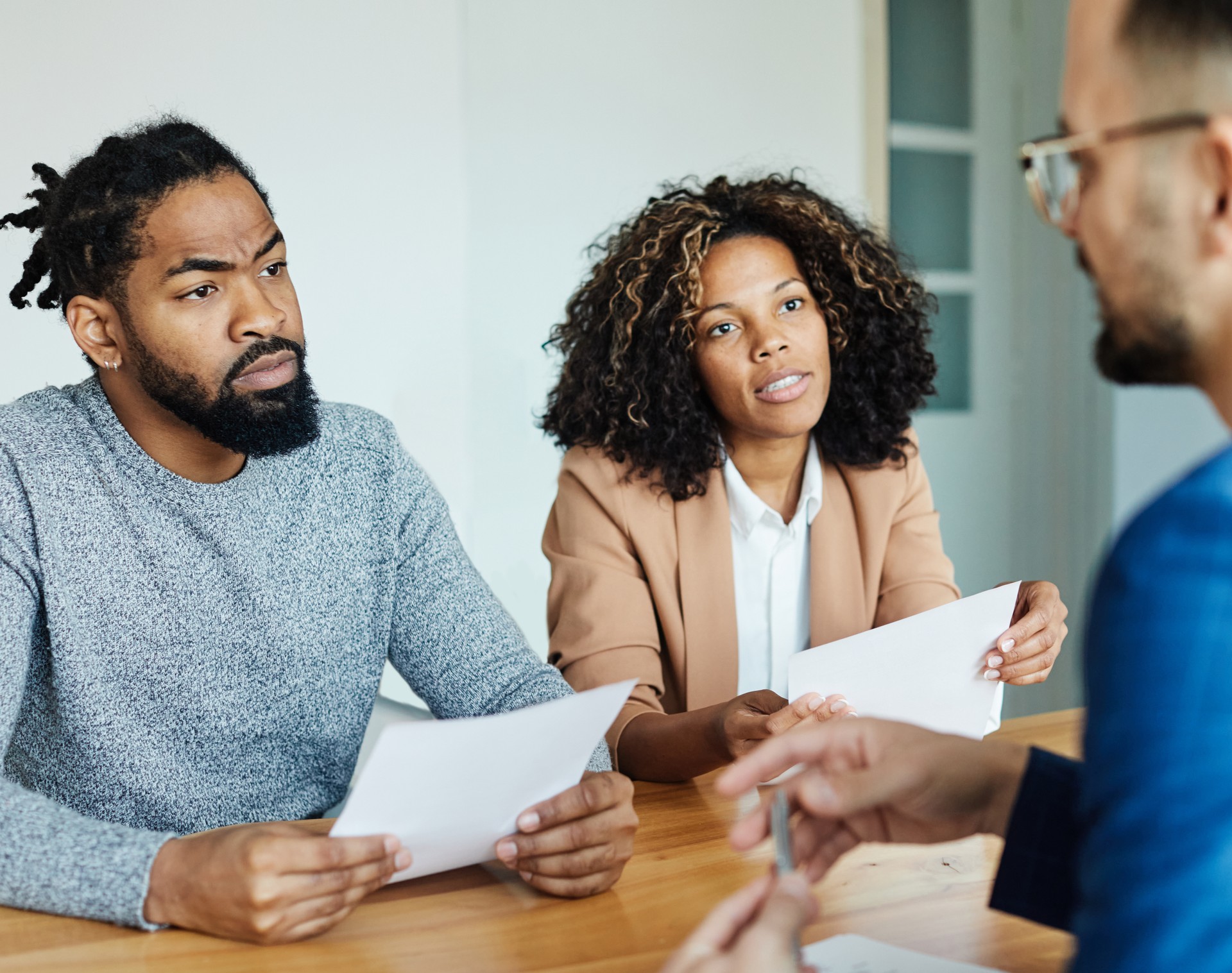 contract woman man signing couple investment house agent real estate business agreement client office home property meeting mortgage document insurance